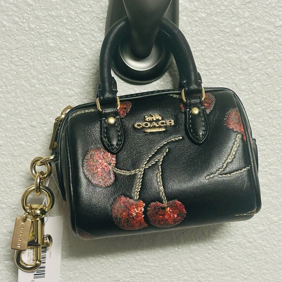 Coach Handbags - Coach Black Mini Bag Keychain with Red Sparkling Cherry Design